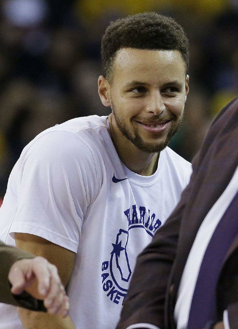 Golden State Warriors guard Stephen Curry before an NBA basketball game against the Chicago Bulls in Oakland, Calif., Friday, Nov. 24, 2017. 