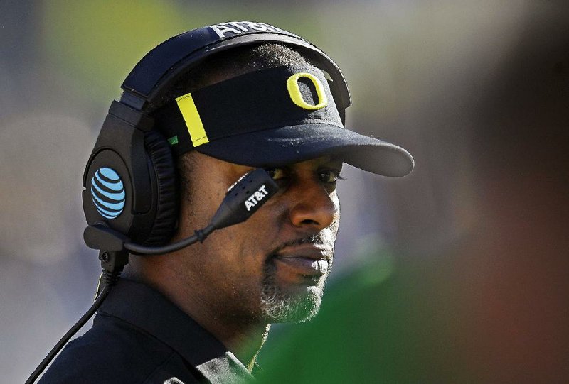 In this Oct. 21, 2017, file photo, Oregon head coach Willie Taggart looks on from the sideline during the second half of an NCAA college football game against UCLA in Pasadena, Calif. 