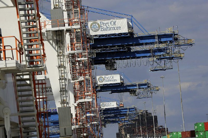Cranes sit idle at the Port of Baltimore in late 2016. The U.S. trade deficit widened in October to a nine-month high on record imports that reflect steady domestic demand, the Commerce Department reported Tuesday. 