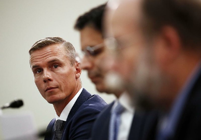 Troy Hunt (left), an Australian information security researcher and troubleshooter, participates in a hearing last week before the U.S. House Committee on Energy and Commerce on the impact of data breaches. 