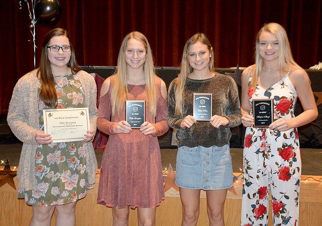 Graham Thomas/Herald-Leader Four Siloam Springs volleyball players were recognized with 6A-West Conference awards. Senior Allie Bowman, left, was named all-conference honorable mention, while juniors Ellie Lampton, Chloe Price and senior Shaylon Sharp were all-conference. The award ceremony was held Sunday at the Siloam Springs High School theater.