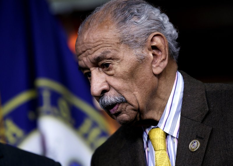The Associated Press CONYERS RESIGNS: In this file photo from Feb. 14 Rep. John Conyers, D-Mich., attends a news conference on Capitol Hill in Washington. Besieged by allegations of sexual harassment, Conyers resigned from Congress on Tuesday bringing an abrupt end to the civil rights leader's nearly 53-year career on Capitol Hill.