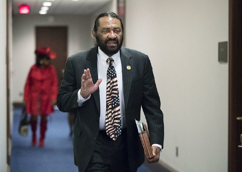 In this photo from Wednesday, Nov. 29, 2017, Rep. Al Green, D-Texas, arrives for a Democratic Caucus meeting on Capitol Hill in Washington.