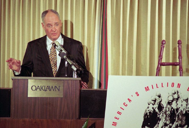 In an announcement in Hot Springs in February 1998, Oaklawn President Charles Cella announces “America’s Million Dollar Dare,” a $1 million prize for the winner of the Oaklawn Handicap. The race, on April 4 of that year, was won by Precocity, a Bob Baffert horse. Cella helped introduce a number of innovations that have helped draw many top thoroughbreds as well as racing fans to the track. 