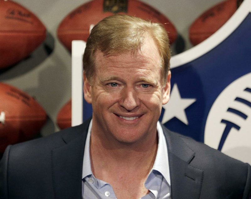 NFL Commissioner Roger Goodell poses for a picture at the opening of "NFL Experience" in Times Square, New York, Thursday, Nov. 30, 2017.