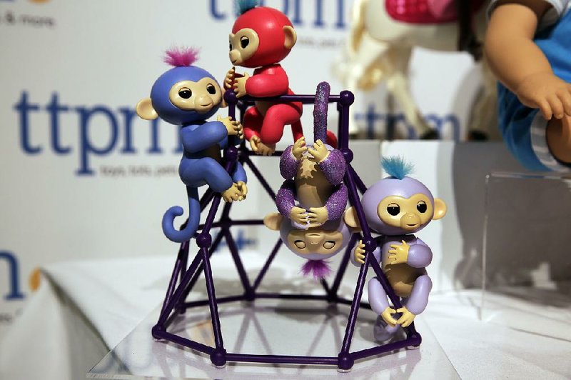 Popular Fingerling toys from WowWee, shown at a Christmas toy showcase in New York in September, are difficult to find online.