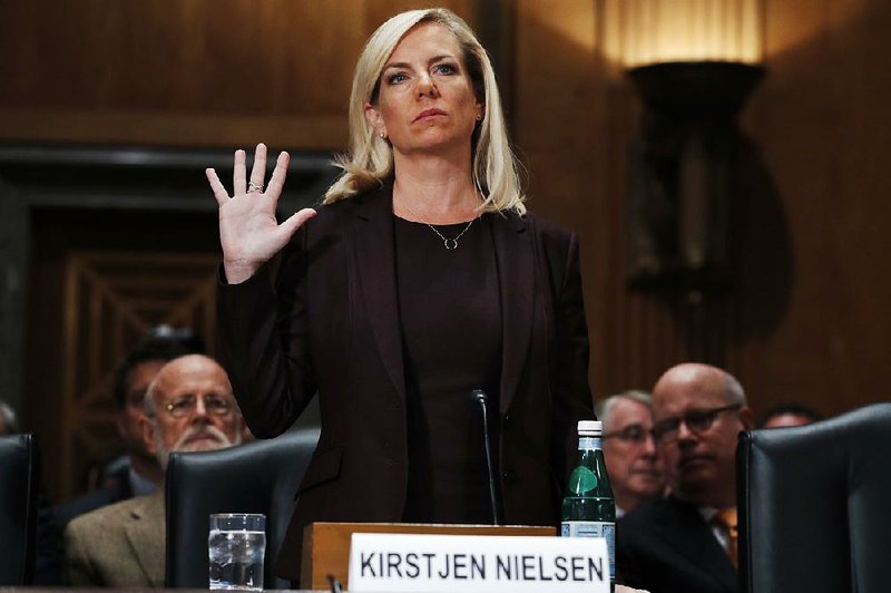 Kirstjen Nielsen is sworn in at a hearing Wednesday on her nomination to be secretary of the Department of Homeland Security. 
