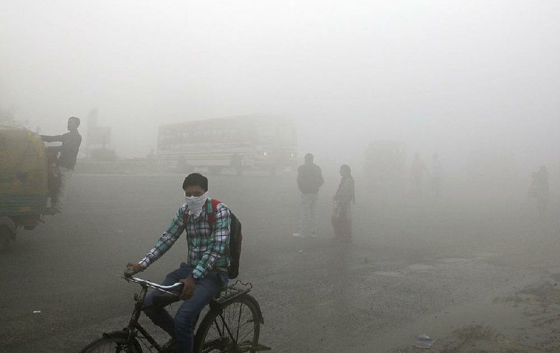 Thick smog last month blankets New Delhi, which has been choking on pollution in recent weeks as air quality deteriorates near the end of the year. 