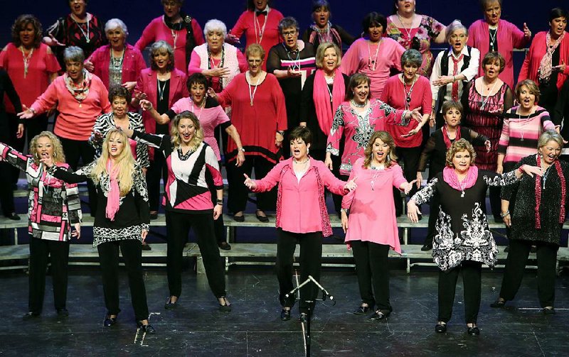 Top of the Rock Chorus performs as part of “Dear Santa, I Can Explain,” Saturday at University of Arkansas-Pulaski Technical College in North Little Rock.
