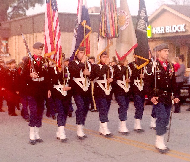 Sally Carroll/McDonald County Press The Junior ROTC marches in the Pineville Christmas parade.