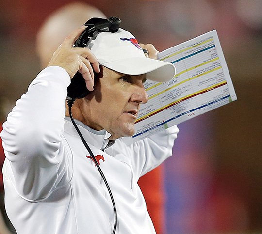 The Associated Press COACHING CHANGE: Chad Morris, shown here coaching SMU against South Florida on Nov. 19, 2016, in Dallas, was announced Wednesday as the new head football coach at the University of Arkansas. Morris had a record of 14-22 in three seasons at SMU after spending four seasons as offensive coordinator at Clemson.