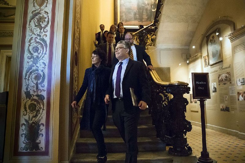 Sen. Al Franken leaves the Capitol with his wife, Franni Bryson, after his speech Thursday on the Senate floor.