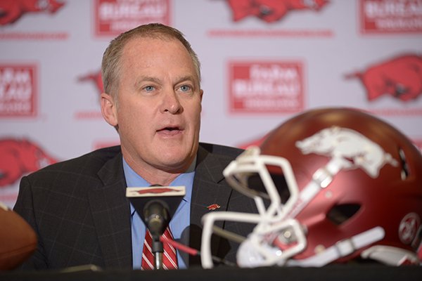 Hunter Yurachek, athletics director at the University of Arkansas, speaks Thursday, Dec. 7, 2017, during a press conference to introduce Chad Morris as the university's newly hired football coach at the Fowler Family Baseball and Track Indoor Training Center in Fayetteville.
