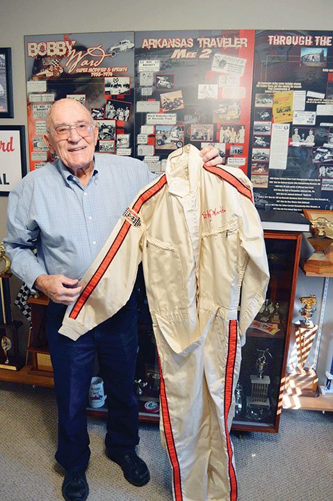Bobby Ward of Conway, a member of two race-car halls of fame, holds one of only two uniforms he had during his 19-year career. Ward, who grew up in Bee Branch, started drag racing and transitioned to stock-car racing in the 1950s, winning 369 feature races, as well as track championships all over the country.