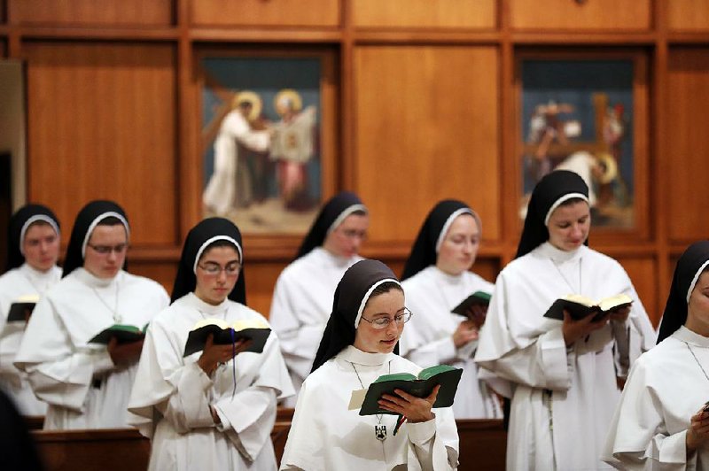 Sisters sing at the Dominican Sisters of Mary, Mother of the Eucharist chapel in Ann Arbor, Mich. The nuns are part of a 130-member Catholic order with a  third album  titled Jesu, Joy of Man’s Desiring: Christmas With the Dominican Sisters of Mary.
