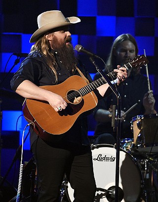 Chris Stapleton performs at the Country Music Association’s Award show ...
