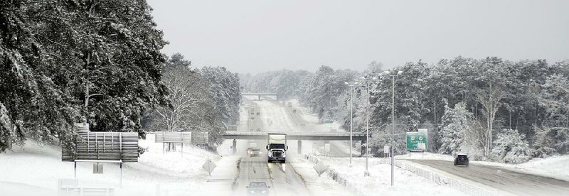 Light traffic moves along Interstate 55 in McComb in south Mississippi on Friday.
