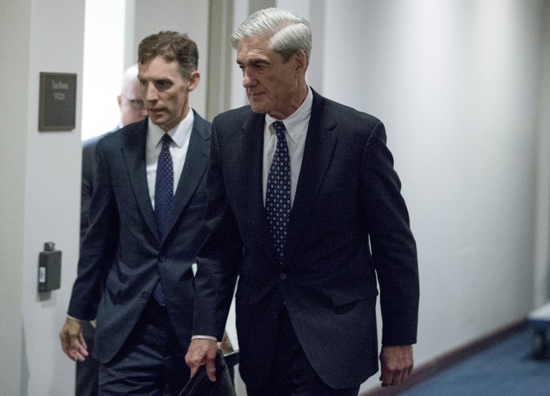 In this June 21, 2017, file photo, former FBI Director Robert Mueller, the special counsel probing Russian interference in the 2016 election, departs Capitol Hill following a closed door meeting in Washington. 