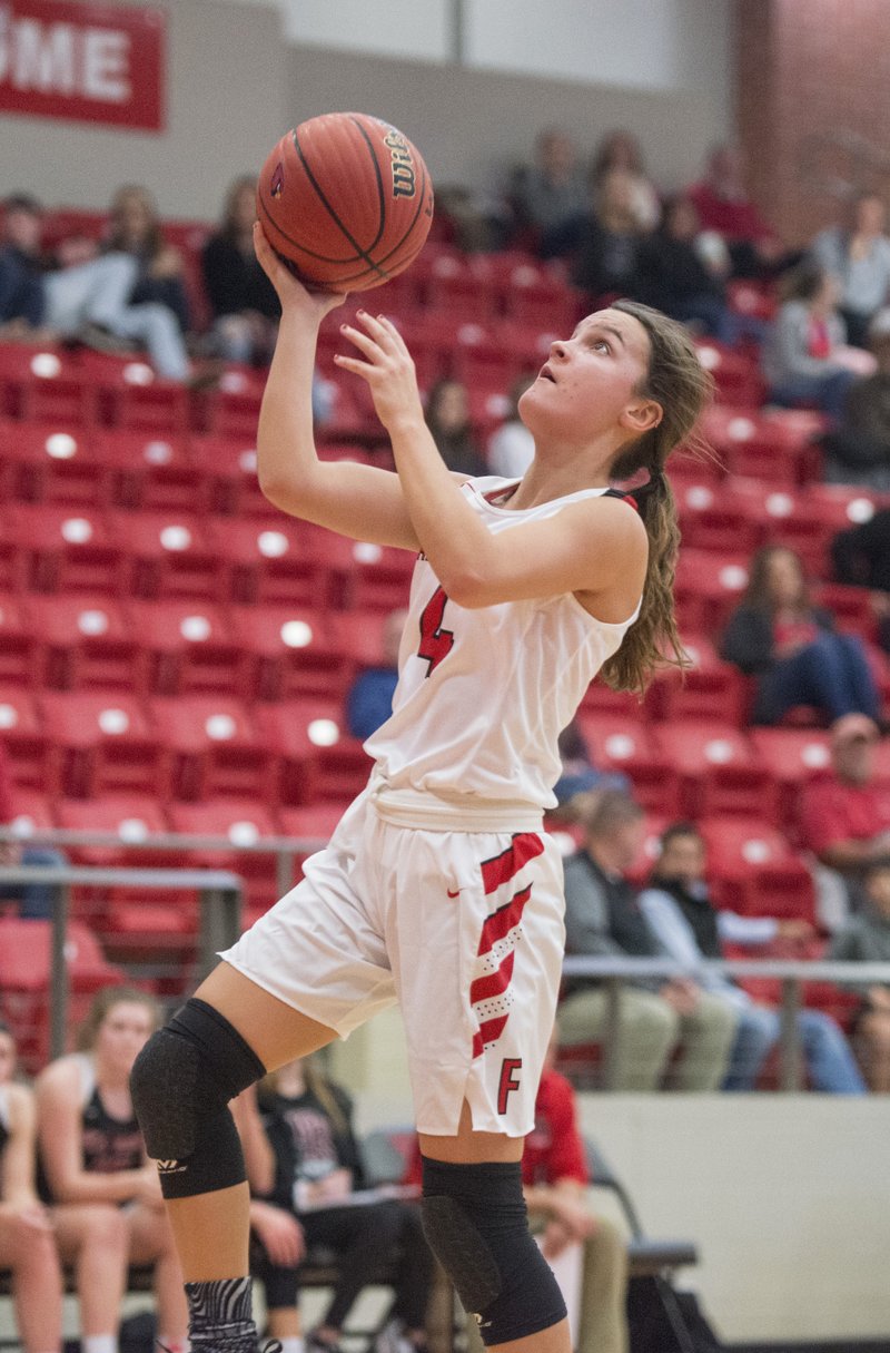 Madisyn Pense of Farmington shoots in the first half against Pea Ridge on Friday during the Tony Chachere's Classic at Cardinal Arena in Farmington.