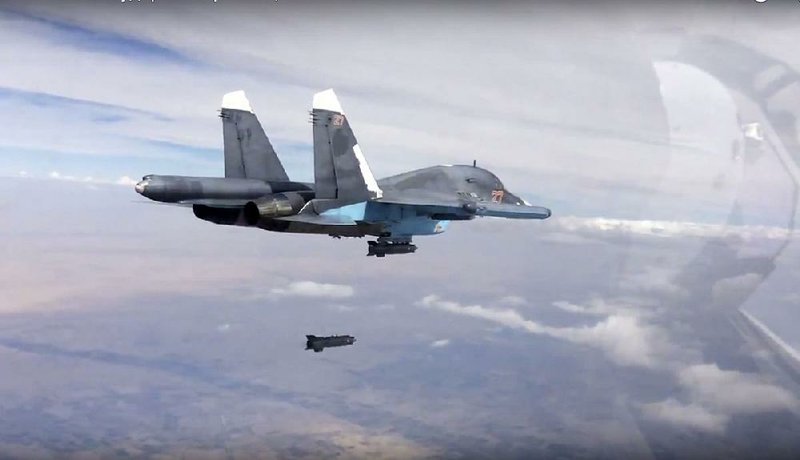 A Russian Su-34 strike fighter releases a bomb over Syria in this 2015 Russian Defense Ministry image. In recent weeks, Russian pilots have repeatedly violated an agreement with the U.S. military to keep on opposite sides of the Euphrates River, risking midair collisions, U.S. officials say.