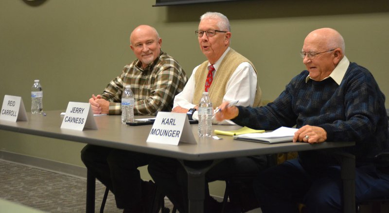 Mike Capshaw/Siloam Sunday Board candidates, from left, Reid Carroll, Jerry Cavness and Karl Mounger took part in a "Candidate Forum" hosted by the chamber of commerce at Siloam Springs High School on Thursday.