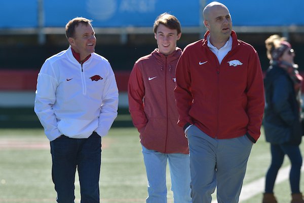 Arkansas head coach Chad Morris (left), Chandler Morris (center) and assistant coach Barry Lunney Jr. (right) during pre-game before the 4A State Championship in Little Rock. Special to the Democrat-Gazette/JIMMY JONES