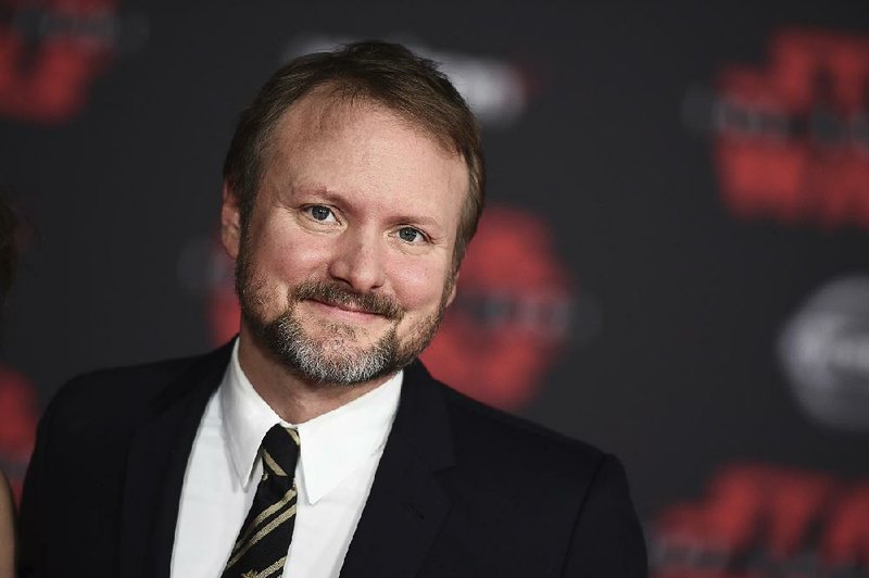 Director Rian Johnson arrives at the Los Angeles premiere of "Star Wars: The Last Jedi" at the Shrine Auditorium on Saturday, Dec. 9, 2017 in Los Angeles. 