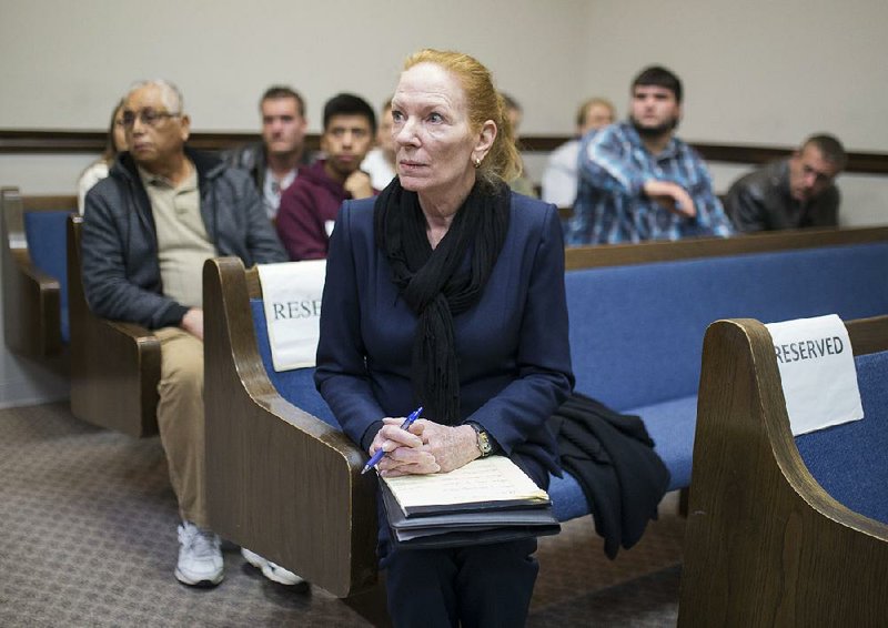 Laura Gordon, a Spanish interpreter, waits for her clients to arrive Thursday at the Courthouse Annex in Bentonville. The court provides ASL and Spanish interpreters.
