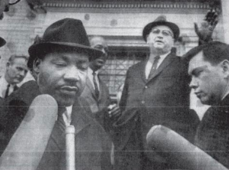 PHOTO BY SPECIAL TO THE DEMOCRAT GAZETTE
Reporter Roy Reed (right) is among the journalists gathered outside the Selma, Ala., city jail when Martin Luther King Jr. was released from the jail after posting a $200 bond in this February 1965 photo.
