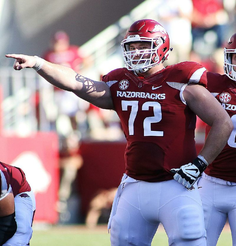 Arkansas’ Frank Ragnow yells out to his teammates before getting set during the fourth quarter Sept. 3, 2016, against Louisiana Tech in Fayetteville. Ragnow was named second-team All-America by the Football Writers Association and third-team All-America by The Associated Press on Monday.