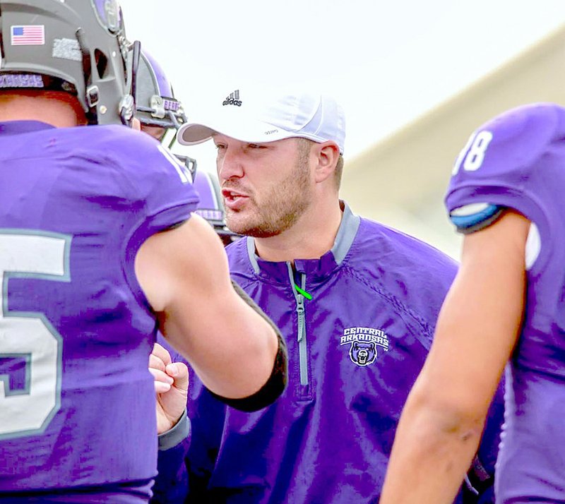 Submitted photo BROWN STAYS PURPLE: Former star UCA quarterback and offensive coordinator Nathan Brown was formally introduced as the Bears' new head coach Monday in Conway. The Bears earned the No. 4 national seed in the FCS playoffs and finished the season 10-2.