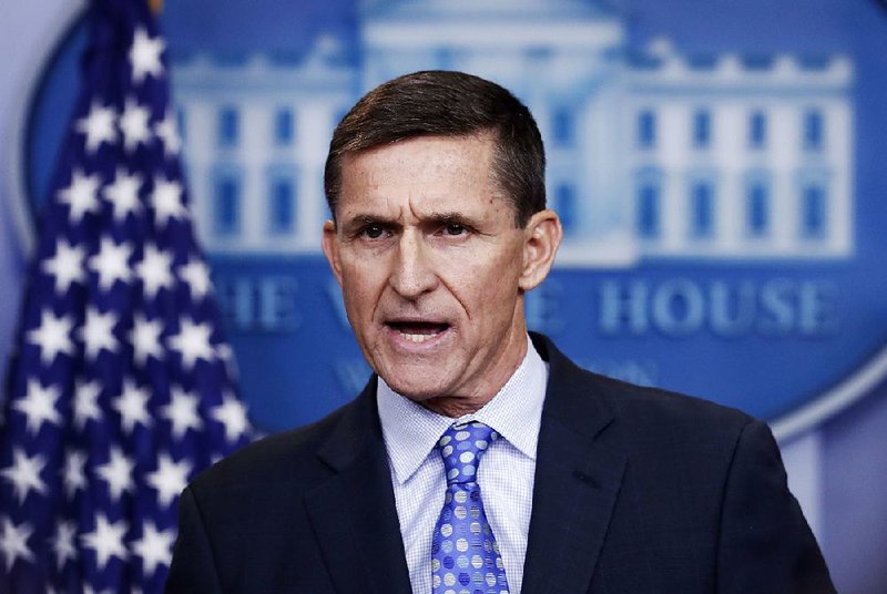  In this Feb. 1, 2017, file photo, former National Security Adviser Michael Flynn speaks during the daily news briefing at the White House, in Washington.