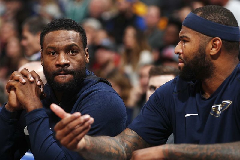 New Orleans Pelicans guard Tony Allen (24) and center Demarcus Cousins in the second half of an NBA basketball game Friday, Nov. 17, 2017, in Denver. 