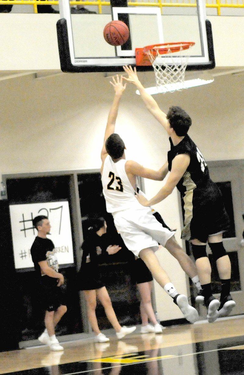 MARK HUMPHREY ENTERPRISE-LEADER Prairie Grove's Nick Pohlman beats a West Fork defender to the hoop for a layup. Pohlman scored 7 points in a 1:22 span late in the fourth quarter of Prairie Grove's come-from-behind 45-43 win over West Fork Dec. 5. Pohlman had a game-high 21 points on 9-of-9 shooting with a trio of 3-pointers.