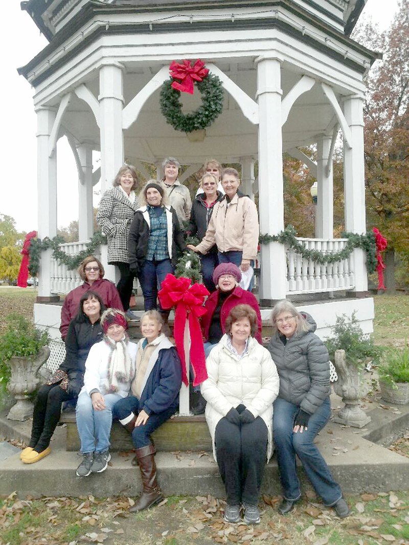 Photo submitted The Primavera Garden Club met on Saturday, Nov. 11, to decorate the downtown gazebo for Christmas. Afterward, they met to have a hot drink at Cafe on Broadway.