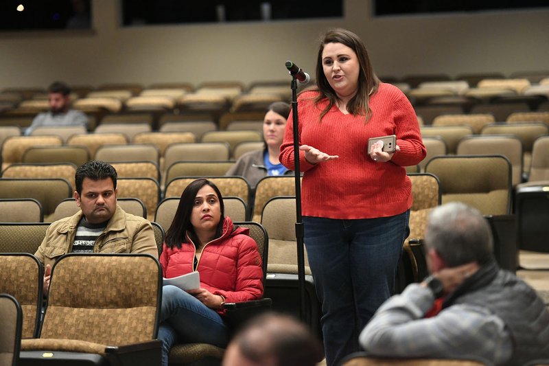 NWA Democrat-Gazette/J.T. WAMPLER Tiffany Todd speaks Wednesday about her special-needs child during a public forum hosted by the Bentonville School District to inform people of the plan to rezone elementary zones for the 2019-20 school year at the Arend Arts Center at Bentonville High School.