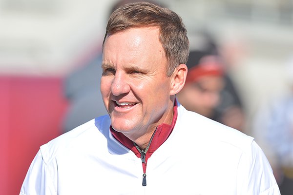 Arkansas coach Chad Morris watches warmups prior to the Class 4A State Championship Game between Warren and Arkadelphia on Saturday, Dec. 9, 2017, at War Memorial Stadium in Little Rock. 