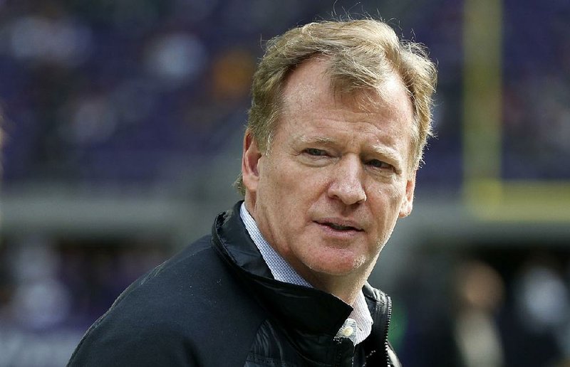  In this Oct. 15, 2017, file photo, NFL commissioner Roger Goodell watches from the sidelines before an NFL football game between the Minnesota Vikings and Green Bay Packers in Minneapolis.