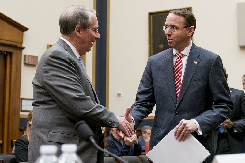 House Judiciary Committee Chairman Bob Goodlatte, R-Va., (left) greets Deputy Attorney General Rod Rosenstein as he arrives Wednesday to testify in front of the committee. 