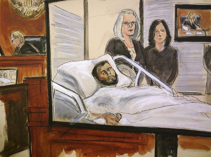 In this courtroom sketch, defendant Akayed Ullah is seen on a video monitor Wednesday from his New York hospital room, joined by his federal defenders Amy Gallicchio (left) and Juliet Gatto. 