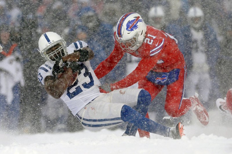 Buffalo Bills free safety Jordan Poyer, right, tackles Indianapolis Colts running back Frank Gore during the second half of an NFL football game, Sunday, Dec. 10, 2017, in Orchard Park, N.Y. (AP Photo/Adrian Kraus)