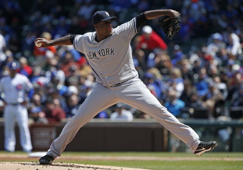 FILE - In this May 5, 2017, file photo, New York Yankees starting pitcher Michael Pineda throws against the Chicago Cubs during the first inning of an interleague baseball game, in Chicago. The Minnesota Twins have signed former New York Yankees starting pitcher Michael Pineda, Wednesday, Dec. 13, 2017, giving a two-year, $10 million contract to the right-hander recovering from Tommy John elbow ligament replacement surgery. (AP Photo/Nam Y. Huh, File)