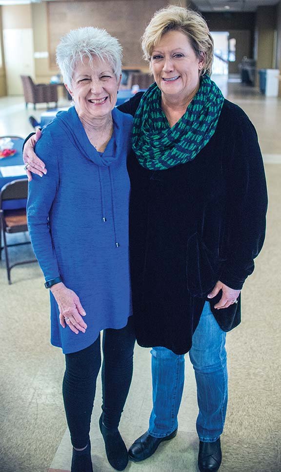 Priscilla Pittman, left, program director for Alzheimer’s Arkansas, stands with Vivian Trickey Smith of Conway, a board member, before the Lunch and Learn program at First United Methodist Church in Conway. Pittman spoke about dementia and the holidays at the free luncheon.