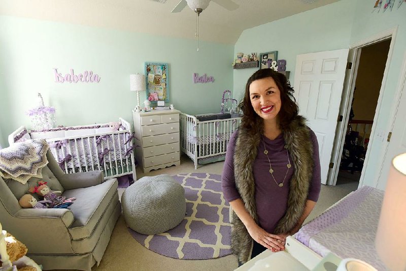 Christina King in the baby room of her home in Bentonville. 