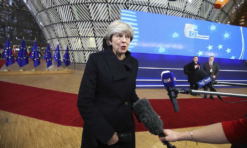 British Prime Minister Theresa May arrives Thursday in Brussels for the European Union summit meeting. 