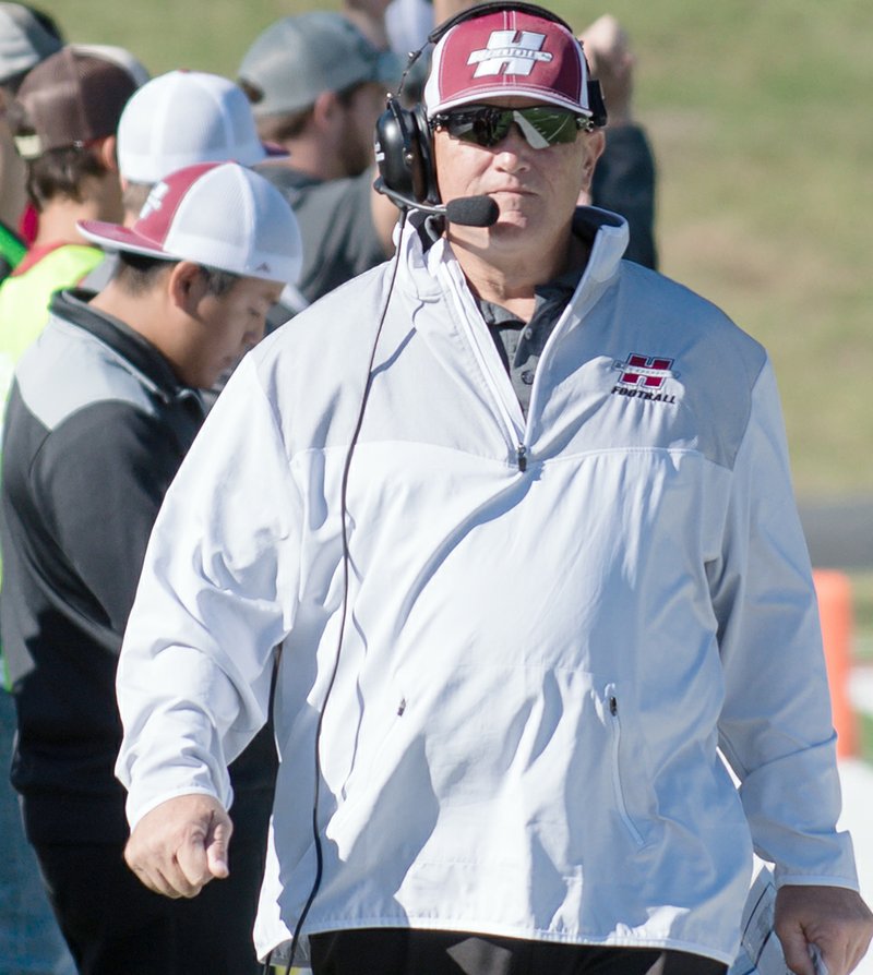 Submitted photo FIVE MORE YEARS: Henderson State University head football coach Scott Maxfield walks the sideline during a game this season. Maxfield, who was on the short list for the University of Arkansas at Pine Bluff's open head football coach position, agreed to a five-year contract extension with HSU.