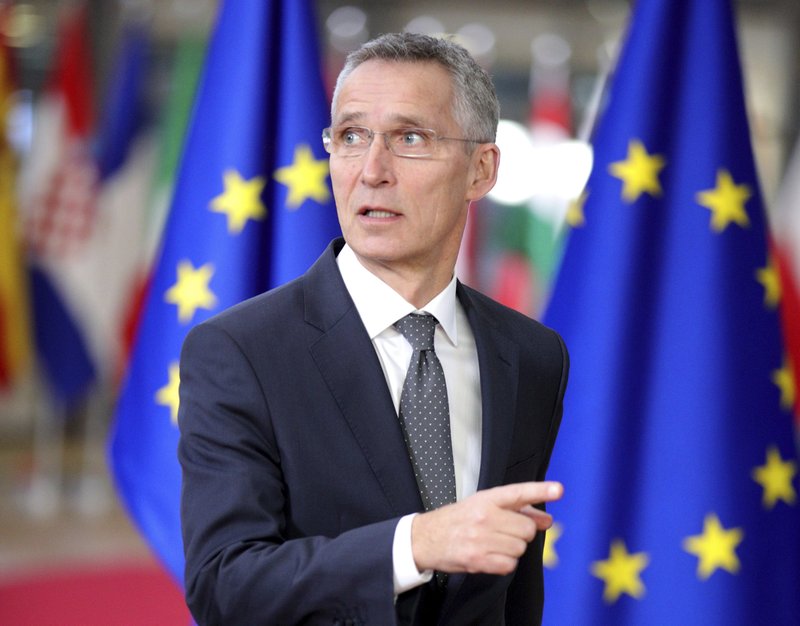NATO Secretary General Jens Stoltenberg arrives for an EU summit at the Europa building in Brussels on Thursday, Dec. 14, 2017. European Union leaders are gathering in Brussels and are set to move Brexit talks into a new phase as pressure mounts on Prime Minister Theresa May over her plans to take Britain out of the 28-nation bloc. (AP Photo/Olivier Matthys)