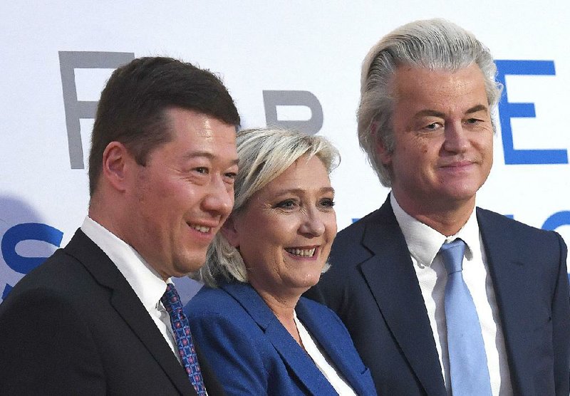 Tomio Okamura (from left) of the Czech Republic, Marine Le Pen of France and Geert Wilders of the Netherlands, the leaders of far-right parties in their respective countries, stand together Saturday after a news conference in Prague. 