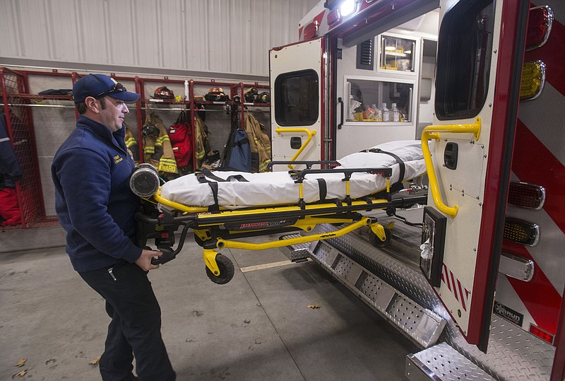 NWA Democrat-Gazette/BEN GOFF &#8226; @NWABENGOFF Ramsey Emerson, Rogers firefighter, talks about the equipment on board the department's Medic 5 ambulance at Rogers Fire Station 5.