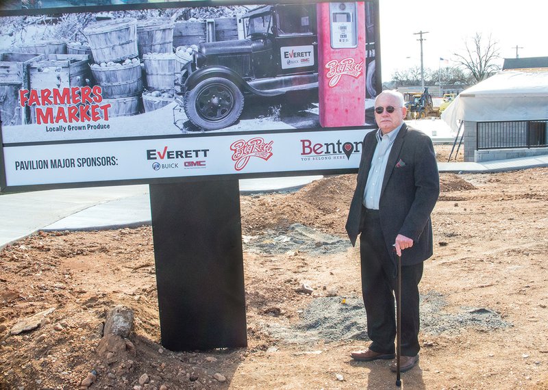 Benton Mayor David Mattingly stands in front of the new sign for the Benton Farmers Market that is set to open in downtown Benton in January. Mattingly said the cost for the farmers market is approximately $520,000, but thanks to a partnership with area businesses, only a portion of the cost will be paid with tax money. 